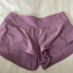 Vivid plum Lululemon athletic shorts, size 2,2.5 low rise.